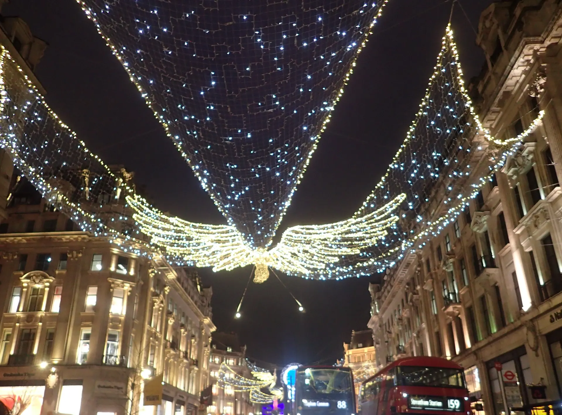 Christmas angels and curtains of sparkling lights above Regent Street, London
